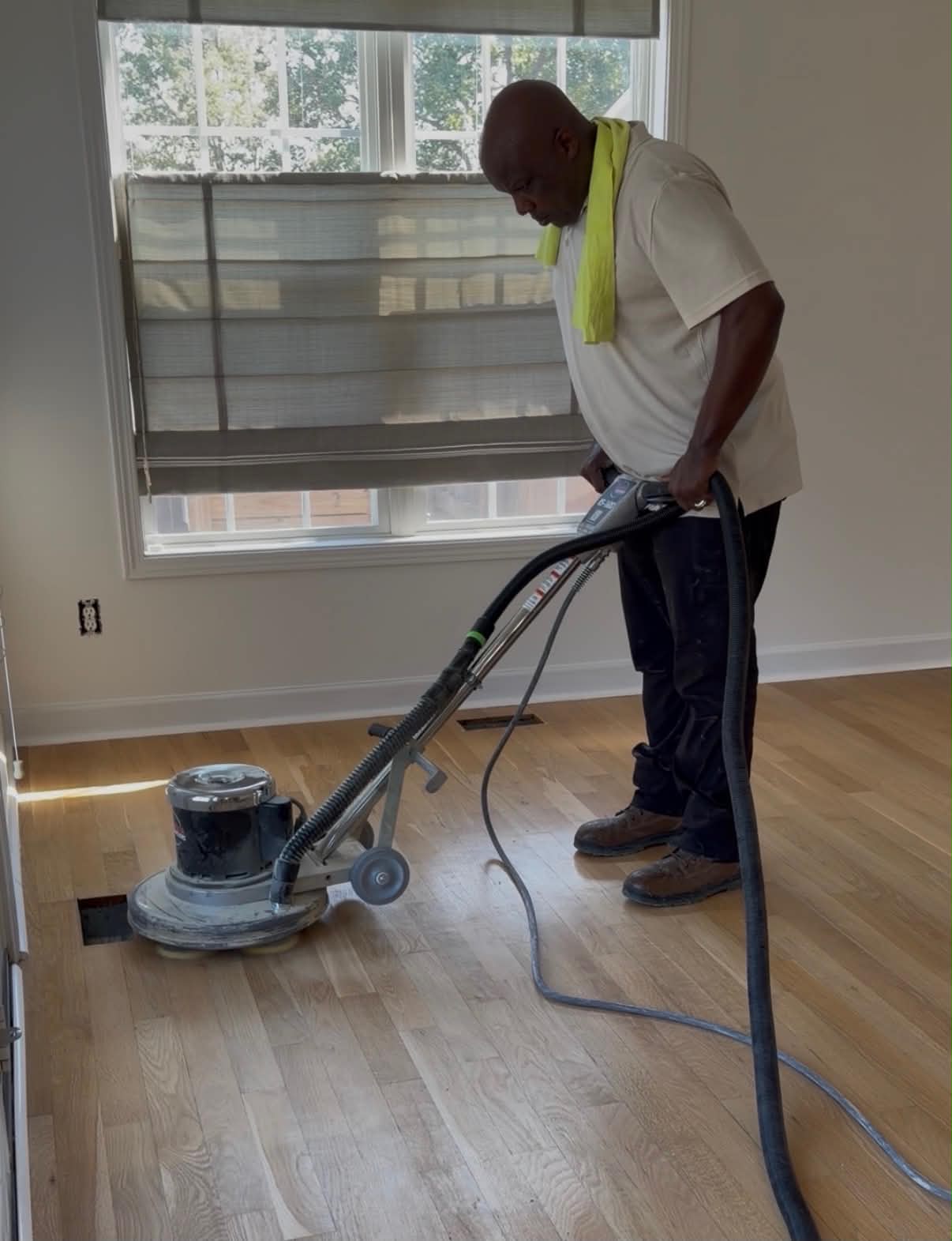 Buffing a light oak hardwood floor